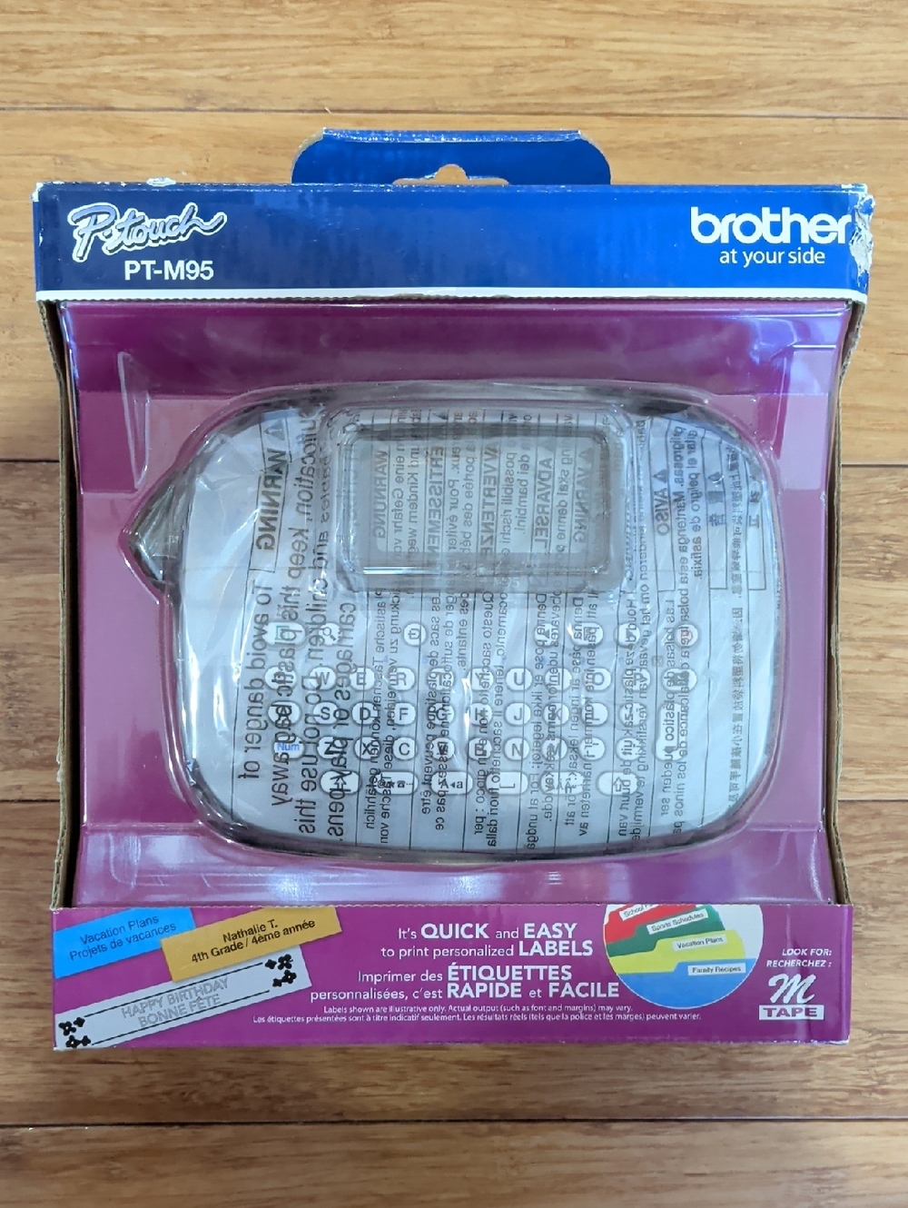 Brother PT-M95 Label Maker in Pink and Blue Packaging